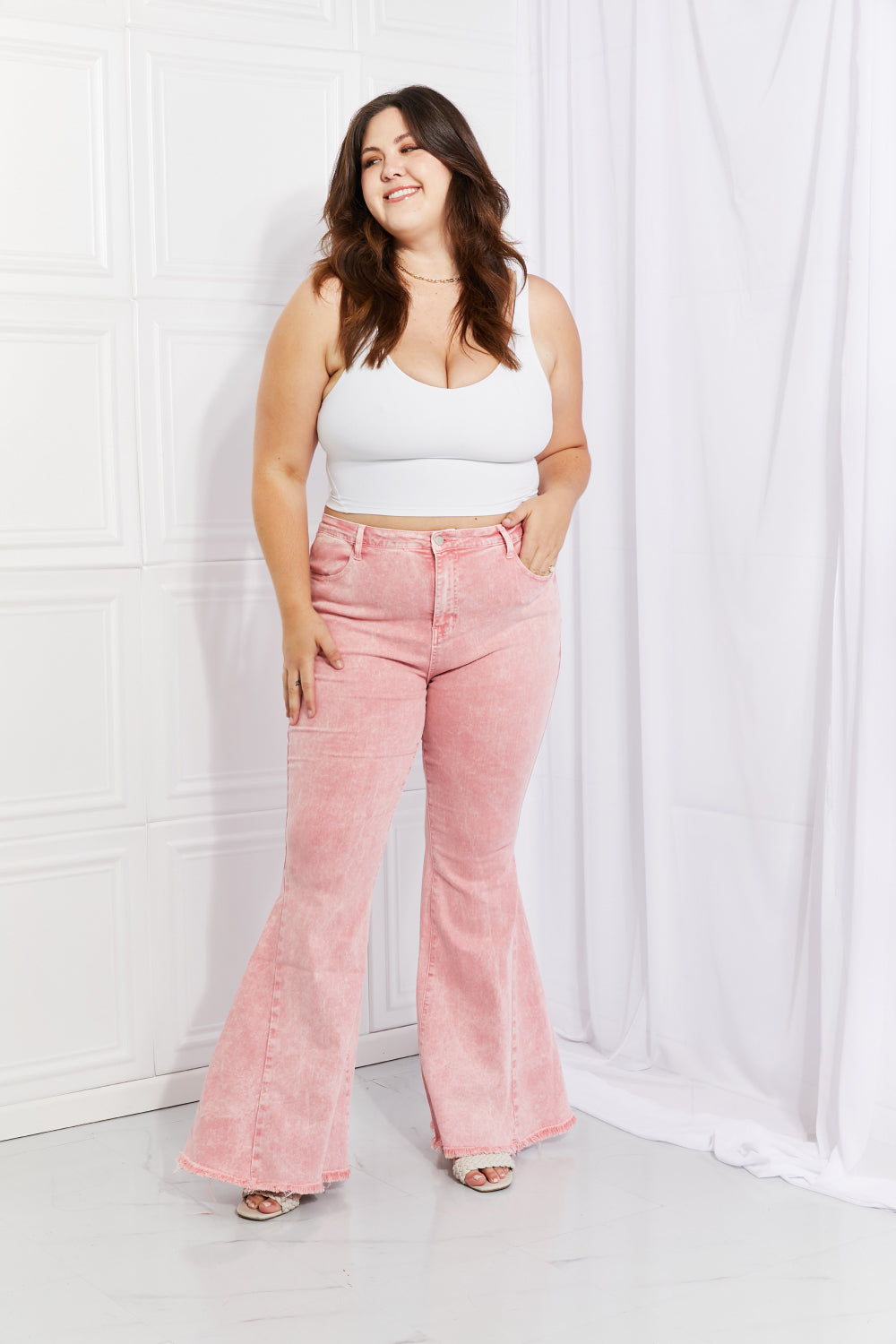 Color Theory Flip Side Fray Hem Bell Bottom Jeans in Pink