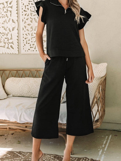 Chic Black Ribbed Two-Piece Pant Set with Flutter Sleeves