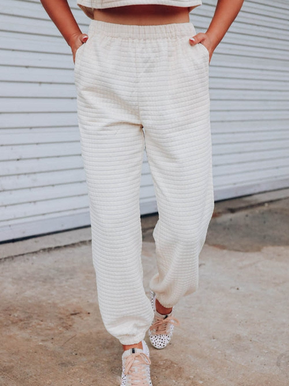 Chic White Textured Lattice Crop Top and Jogger Pants Ensemble