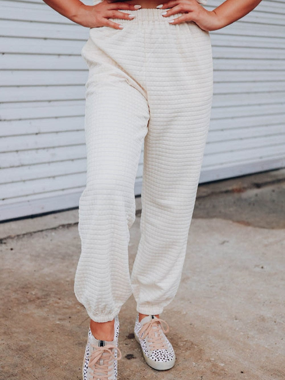 Chic White Textured Lattice Crop Top and Jogger Pants Ensemble