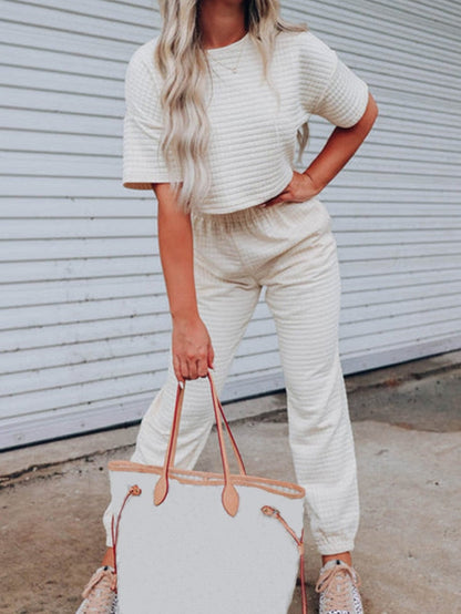 Chic White Textured Lattice Crop Top and Jogger Pants Ensemble