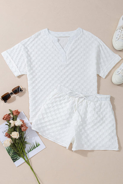 Chic White Textured V-Neck Top and Drawstring Shorts Ensemble