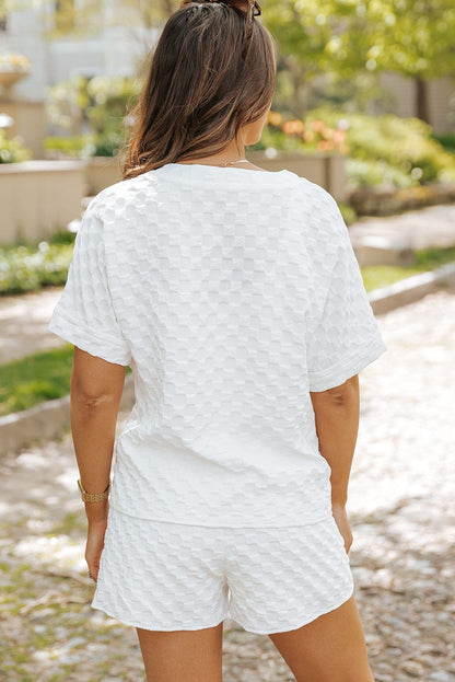 Chic White Textured V-Neck Top and Drawstring Shorts Ensemble