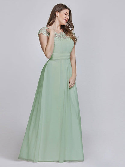 Elegant Lace Cap Sleeve Chiffon Evening Gown with Ruched Detail: Lacey Neckline Open Back Ruched Bust Plus Size Evening Dress