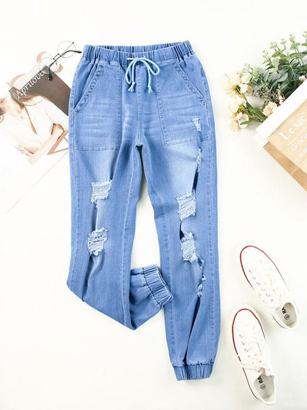 Fashionable and Stylish Denim Harem Jeans with Ripped Legs for Women