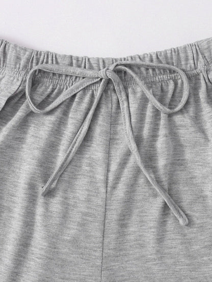 Heathered Knit Tulip Hem Drawstring Shorts