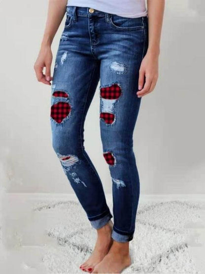 Ripped leopard print denim trousers for Women