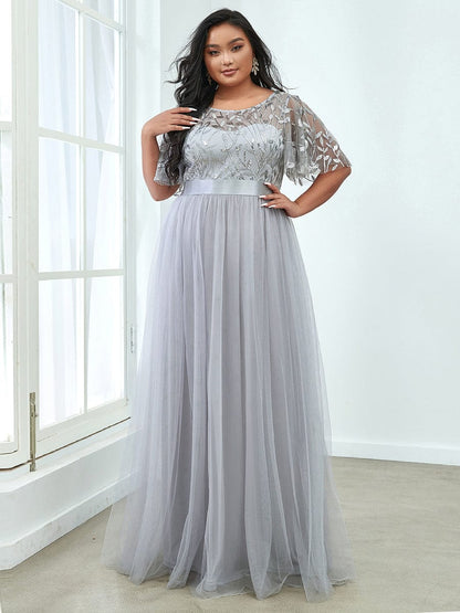 Shimmering Evening Gown with Ruffle Sleeves and Belt Detail