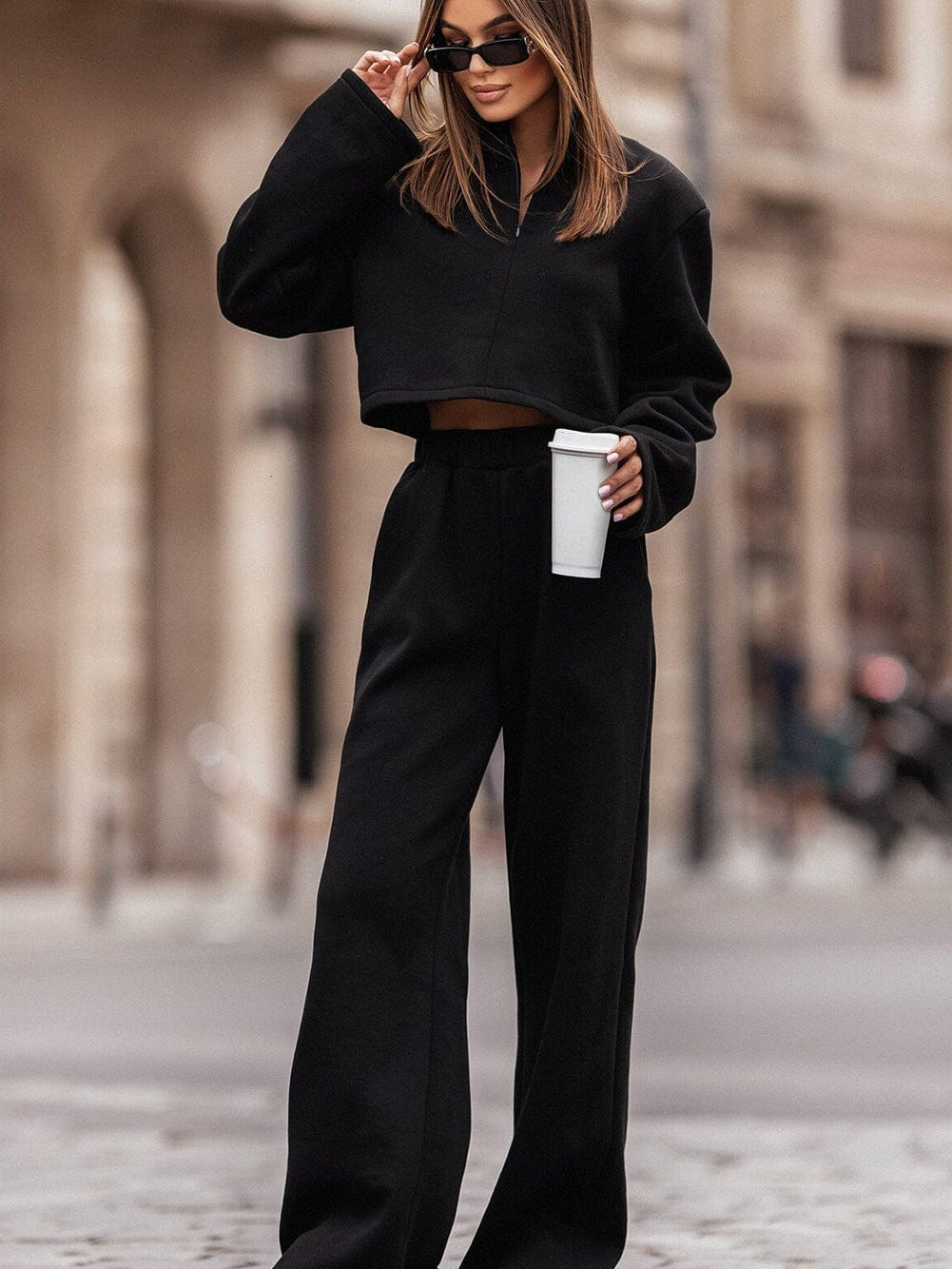 Sleek Black Zippered Collared Top and Wide Leg Pants Ensemble