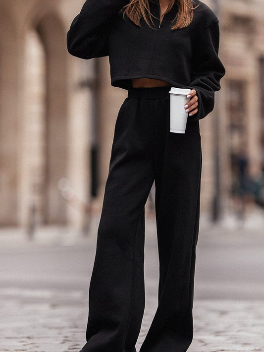 Sleek Black Zippered Collared Top and Wide Leg Pants Ensemble